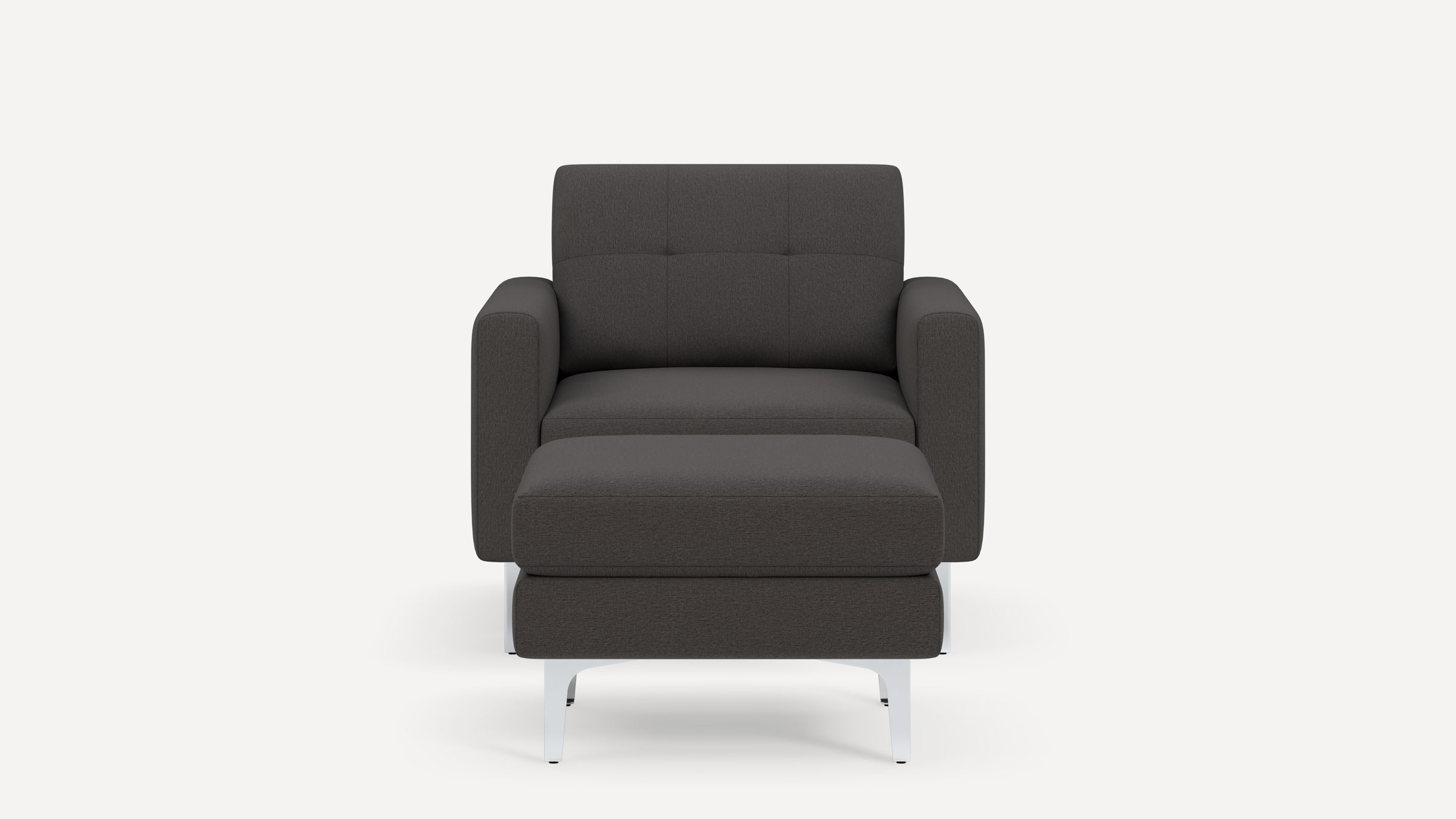 Front view of a modern dark gray upholstered armchair with matching ottoman, featuring clean lines and metal legs.