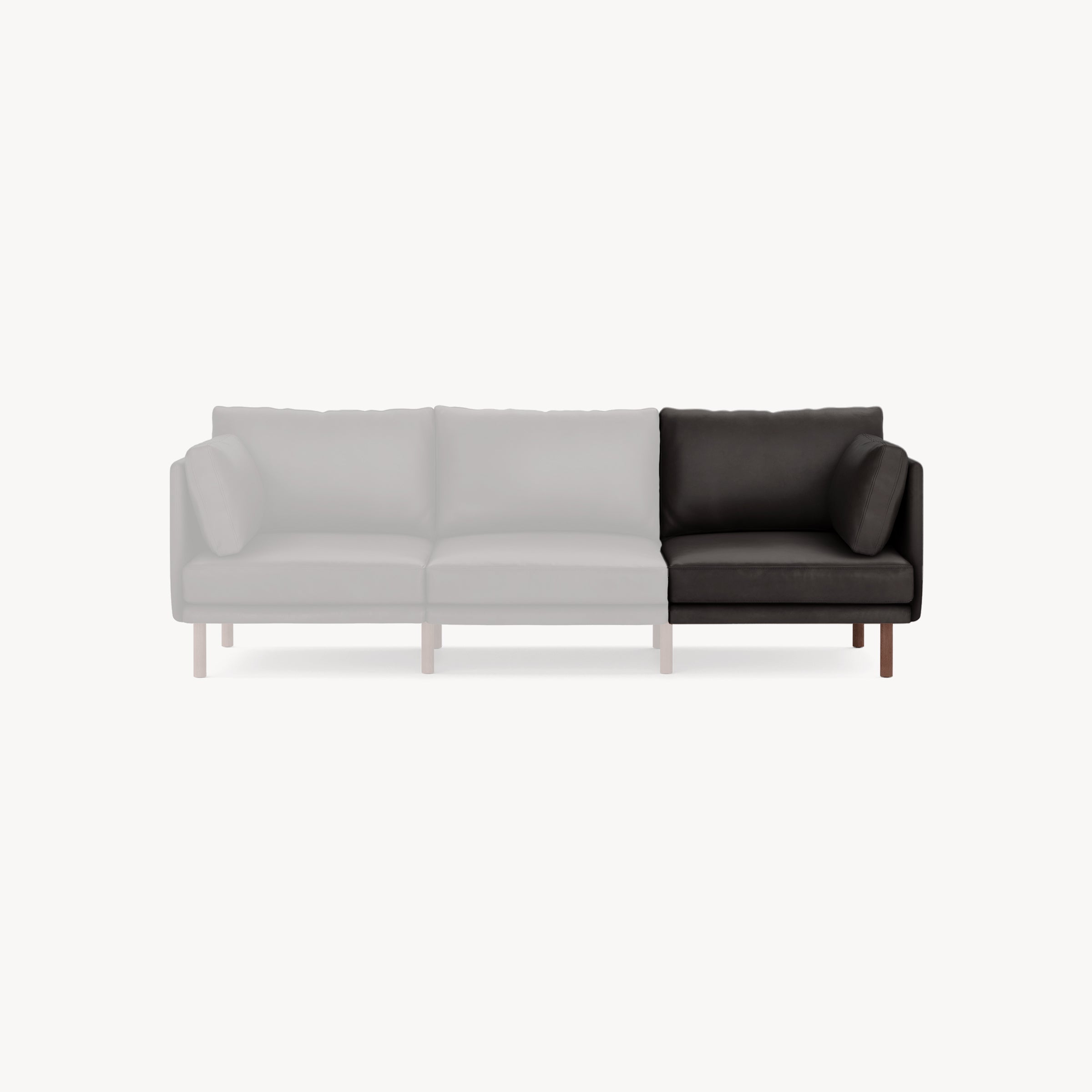 Right section of a modern black leather sofa with wooden legs, shown next to faded gray sections for modularity.