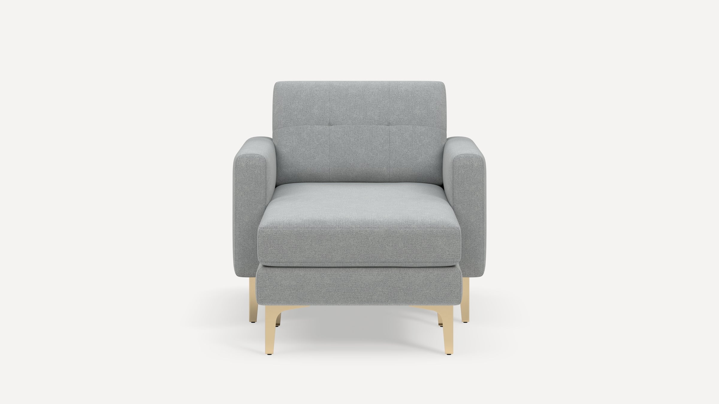 Front view of a modern light gray upholstered armchair with square arms and light wooden legs on a white background.