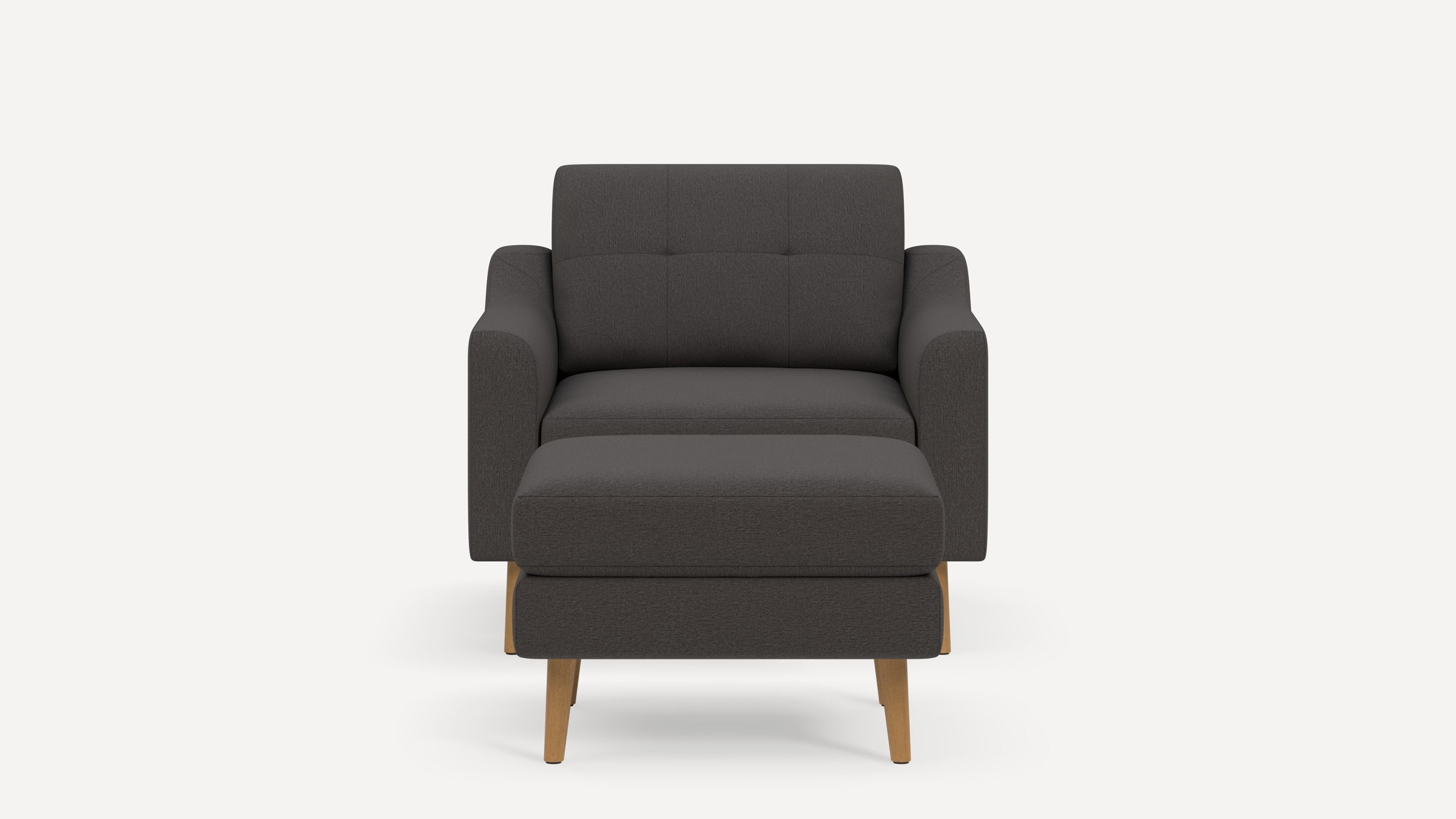 Front view of a dark gray upholstered armchair with a matching ottoman, both featuring wooden legs.