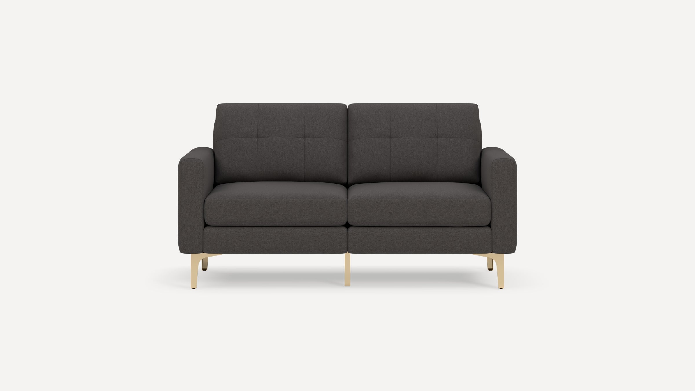 Modern dark gray two-seater sofa with tufted back cushions, clean lines, rounded arms, and gold metal legs on a white background.