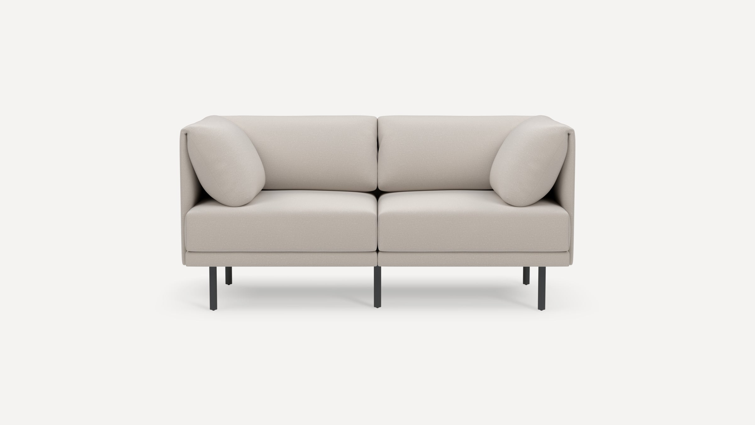 Modern two-seater beige sofa with clean lines, soft cushions, and slim black metal legs on a white background.