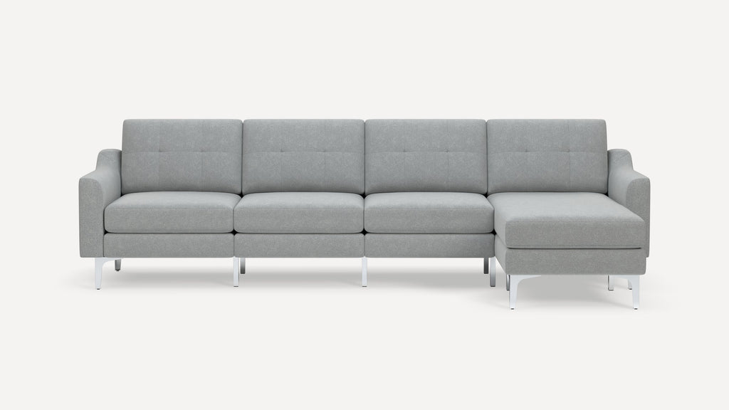 Modern light gray sectional sofa with tufted cushions, clean lines, and metal legs on a white background.