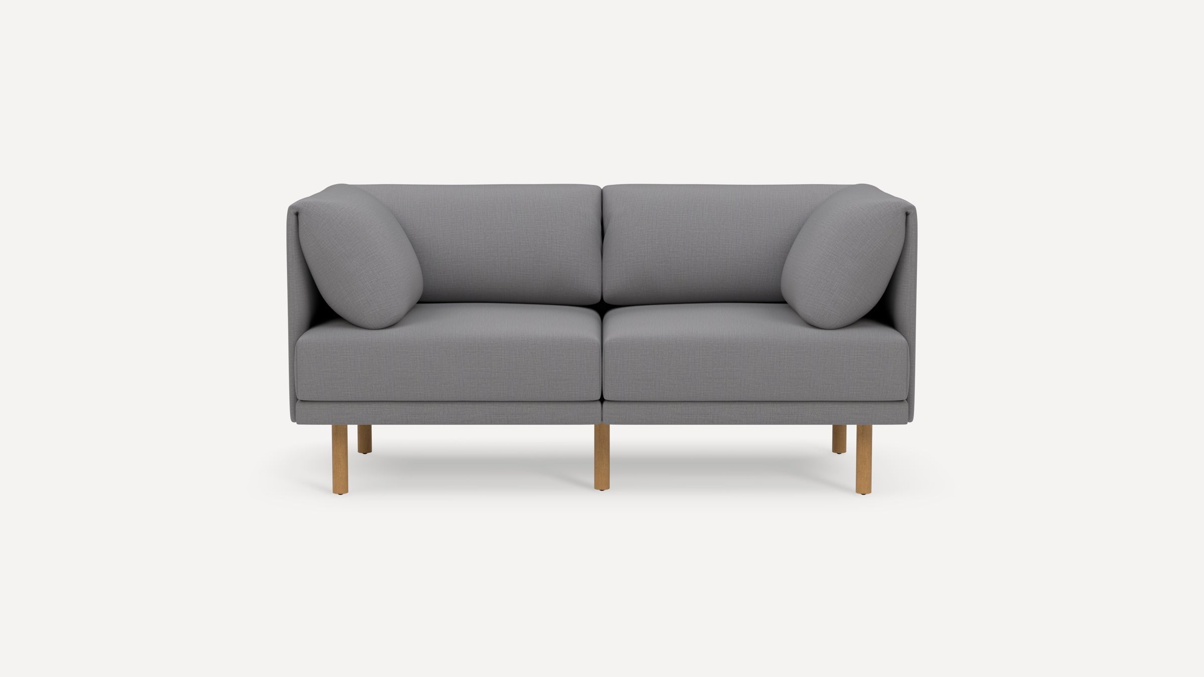 Modern two-seater sofa with light gray fabric upholstery, rounded armrests, and wooden legs, shown on white background.