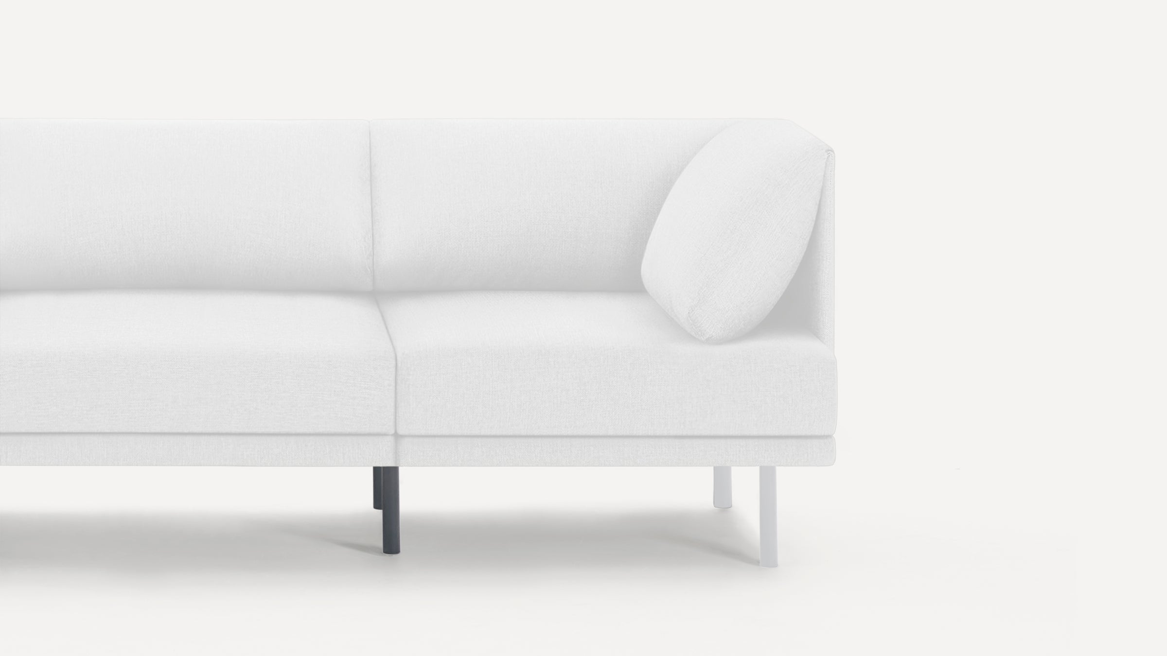 Modern white fabric sectional sofa with clean lines, low back cushions, and contrasting black and white legs on a white background.