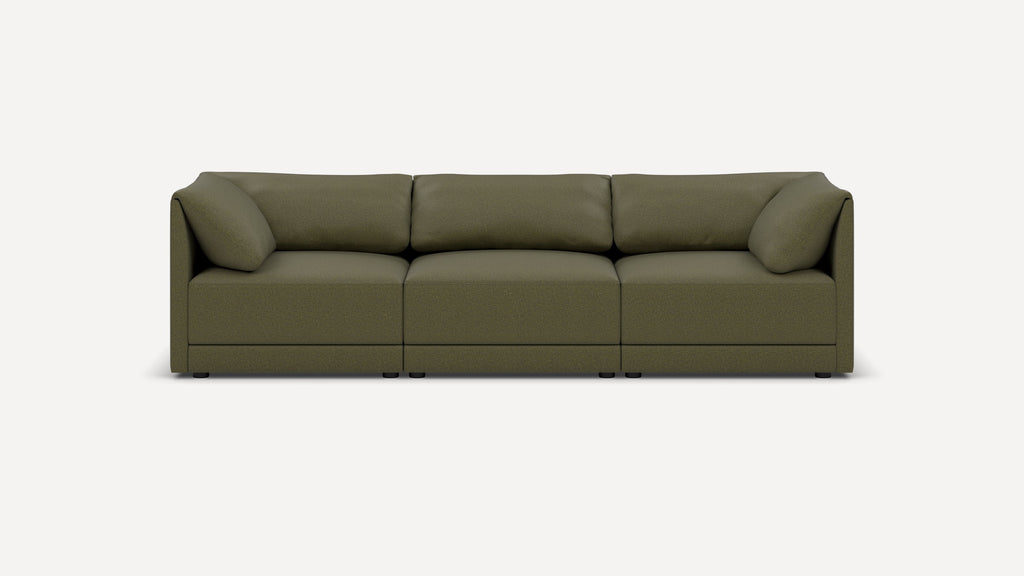 Modern three-seater modular sofa in olive green fabric with plush cushions and clean, straight lines on black legs.