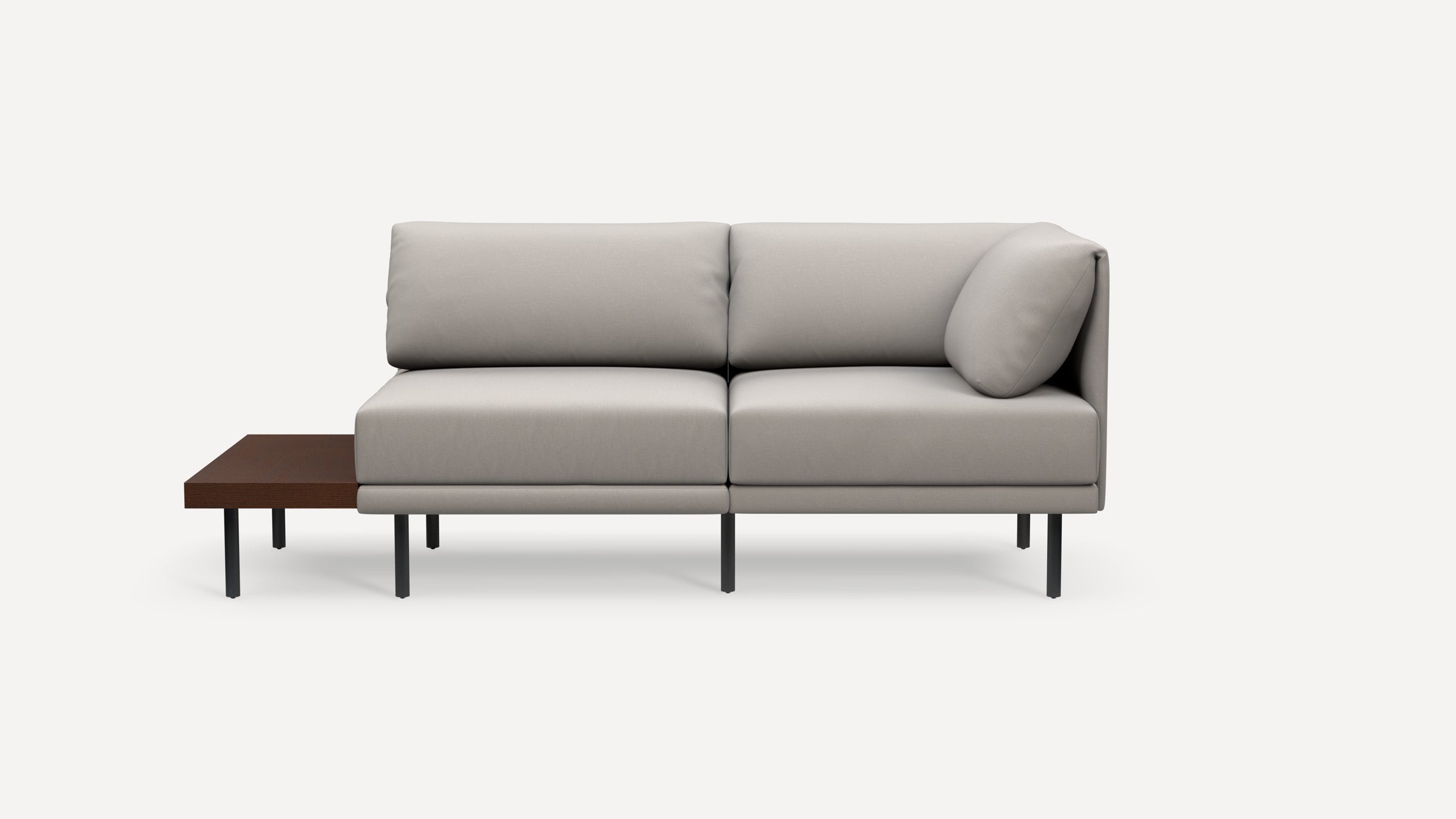 Modern light gray fabric sectional sofa with black metal legs and an integrated dark wood side table on the left side.