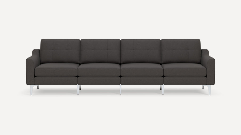 Modern four-seater dark gray fabric sofa with square tufted back cushions and sleek silver metal legs.