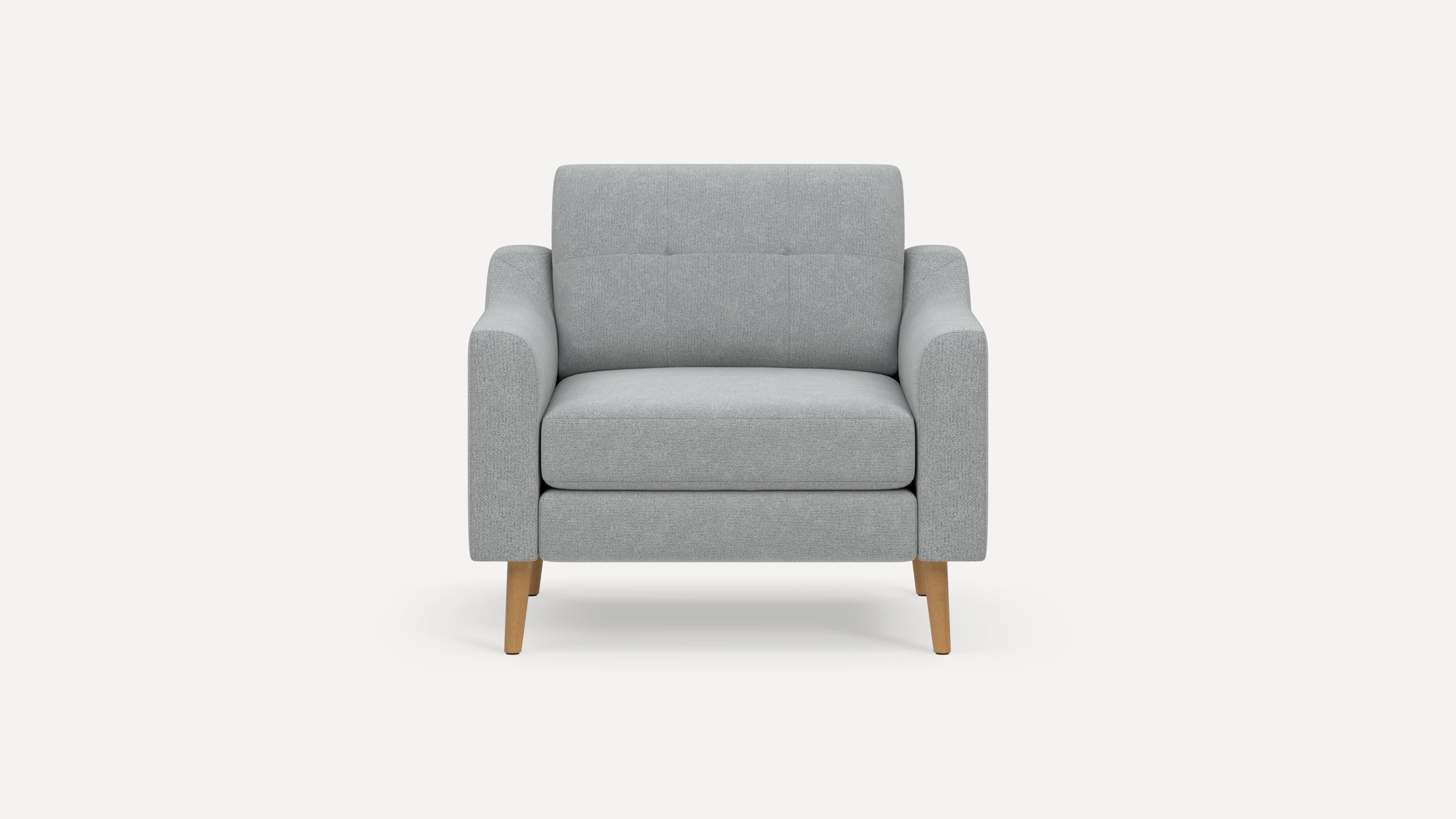 Modern light grey fabric armchair with wooden tapered legs, featuring a cushioned seat, backrest, and armrests.