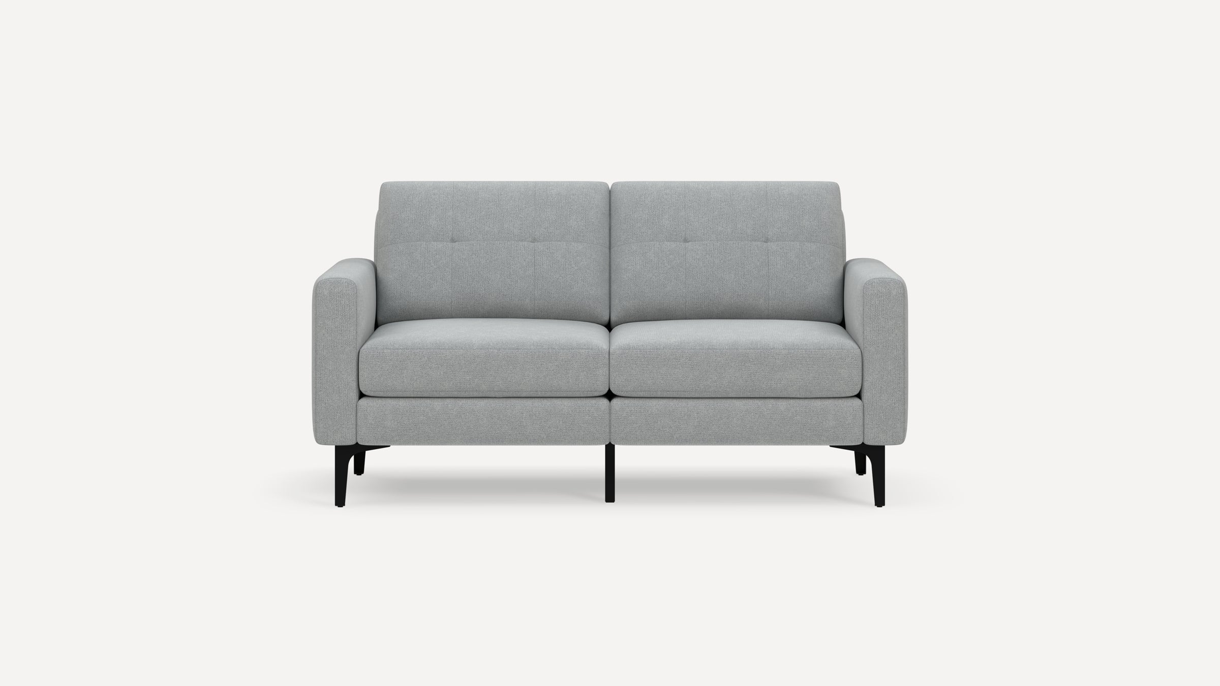 Light gray two-seater sofa with tufted back cushions, simple design, and black metal legs on a white background.