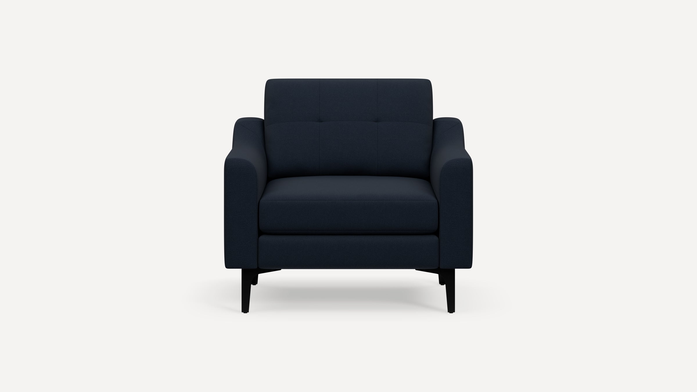 Front view of a modern dark blue upholstered armchair with straight, black legs and slightly curved armrests.