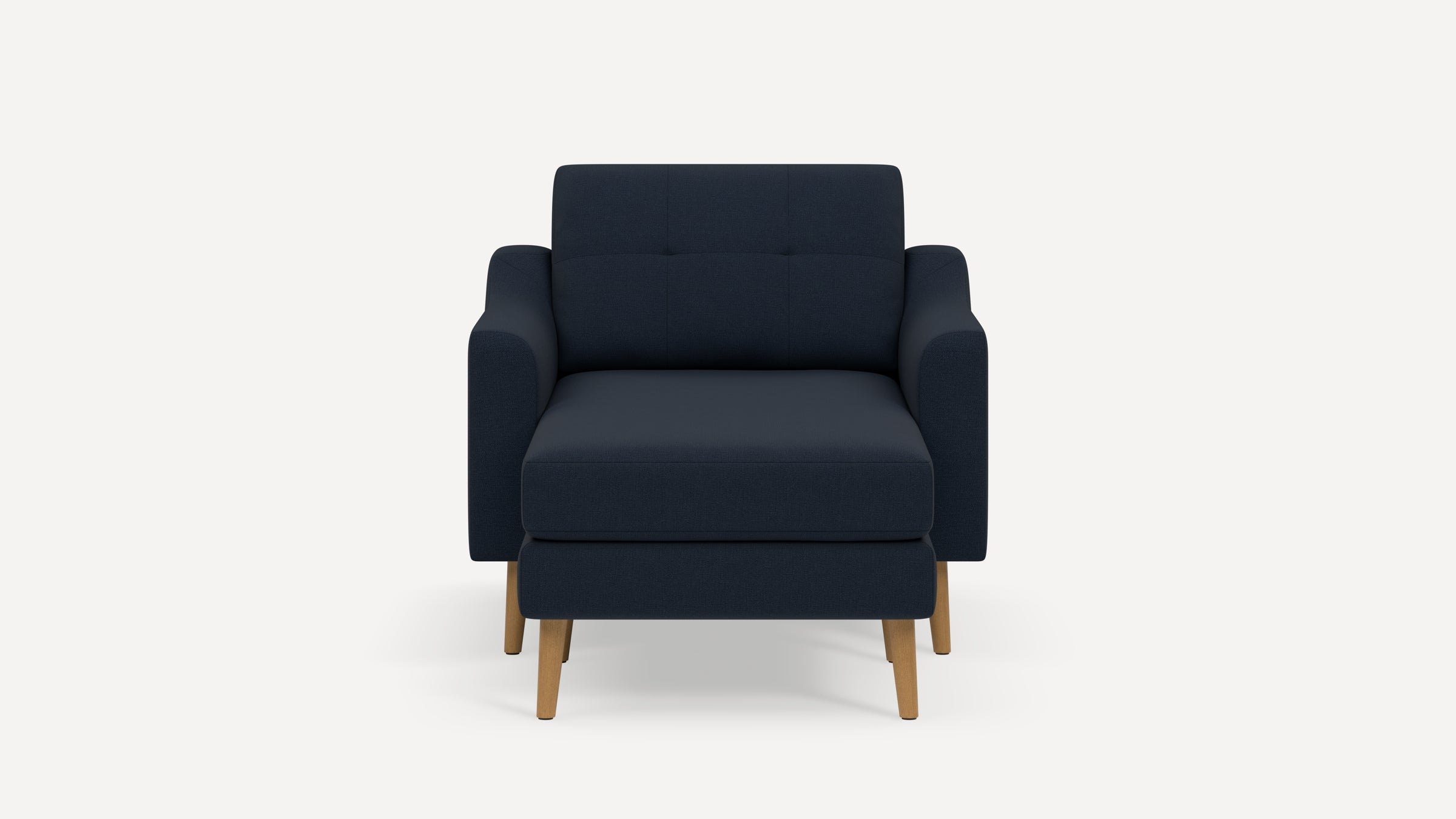 Front view of a modern dark navy blue armchair with wooden legs and a cushioned seat and backrest.