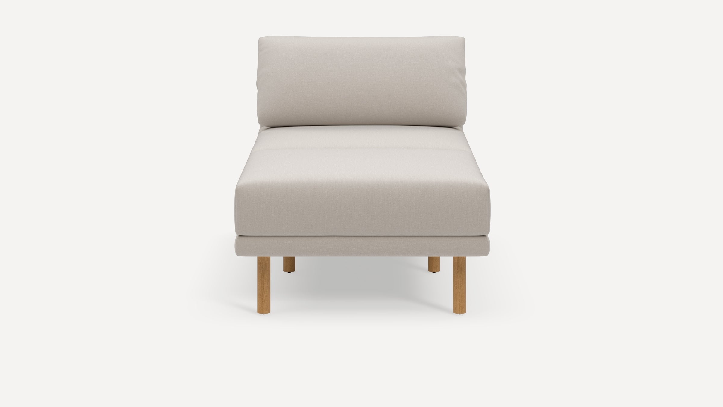 Front view of a modern beige chaise lounge with wooden legs and a cushioned backrest on a white background.