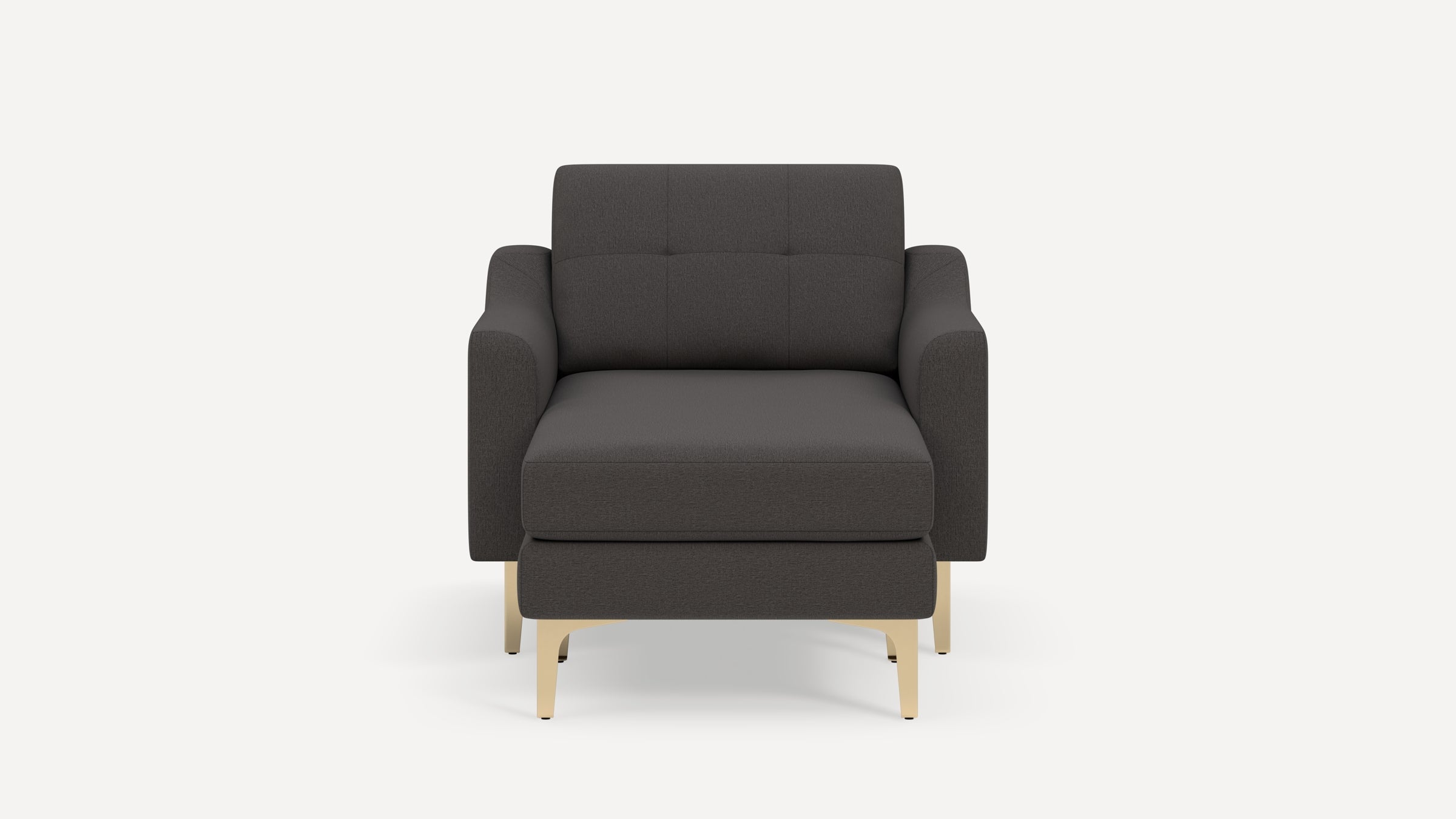 Modern dark gray upholstered armchair with light wood legs, wide cushioned seat, and tufted backrest, viewed from the front.