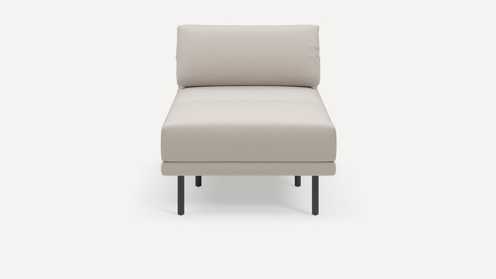 Front view of a modern beige upholstered chaise lounge with a cushioned backrest and black metal legs.