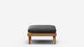 Square wooden ottoman with thick dark gray cushion, minimalist design, four sturdy legs, set against plain white background.