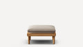 Modern wooden ottoman with beige cushioned top, four short legs, and minimalist design on plain white background.